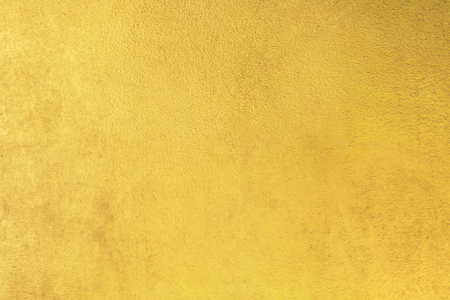 Gold foil abstract background or texture and gradients shadow.の写真素材