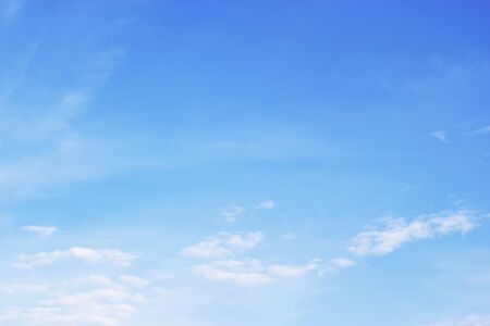 Blue sky background and white clouds soft focus, and copy space.の写真素材