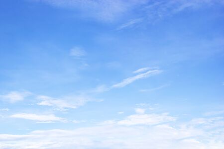 Blue sky background and white clouds soft focus, and copy space.の写真素材