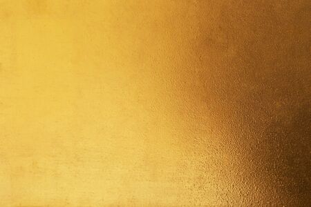 Gold abstract background or texture and gradients shadow.の写真素材