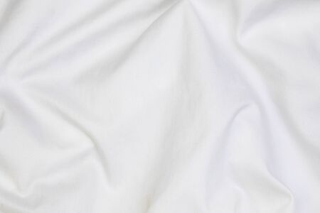Close up of white bedding sheets soft focus and copy space.の写真素材