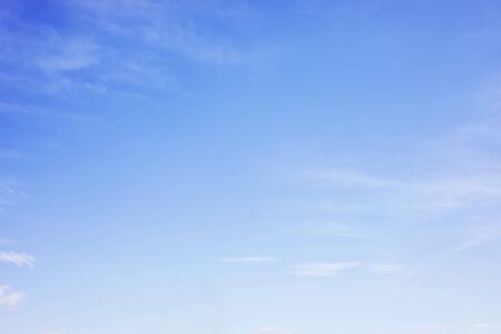 Fantastic soft white clouds against blue sky and copy spaceの写真素材