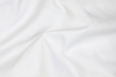 Close up of white bedding sheets soft focus and copy space.の写真素材