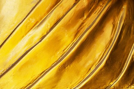 Gold abstract streak background or texture and gradients shadow.の写真素材