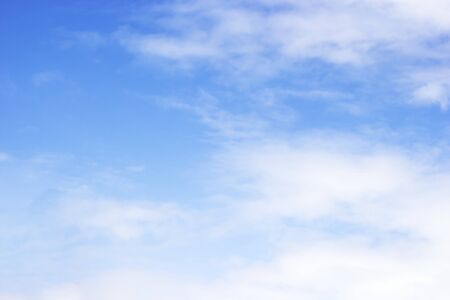 Fantastic soft white clouds against blue sky and copy spaceの写真素材