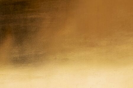 Gold abstract background or texture and gradients shadow.の写真素材