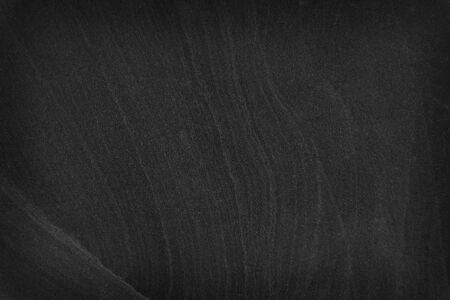 Dark gray black slate stone background or textureの写真素材