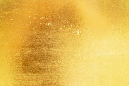 Gold abstract background or texture distress  scratch and gradients shadow.の写真素材