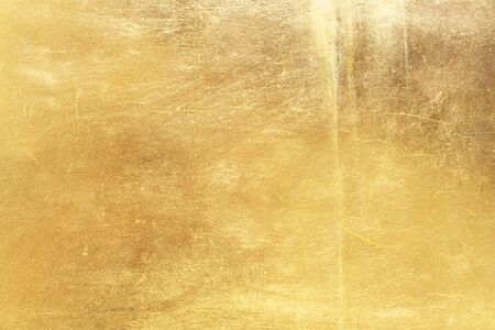 Gold abstract background or texture distress  scratch and gradients shadow.の写真素材