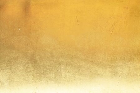 Gold abstract background or texture distress  scratch and gradients shadow.の写真素材