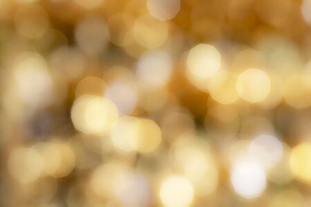 Gold sparkle glitter and copy space for Christmas background.の写真素材
