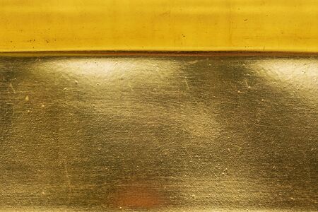 Gold dirty abstract background or texture distress  scratch and gradients shadow.