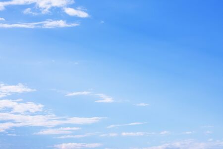 Blue sky background and white clouds soft focus, and copy space.の写真素材