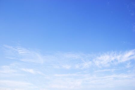 Fantastic soft white clouds against blue sky and copy spaceの写真素材