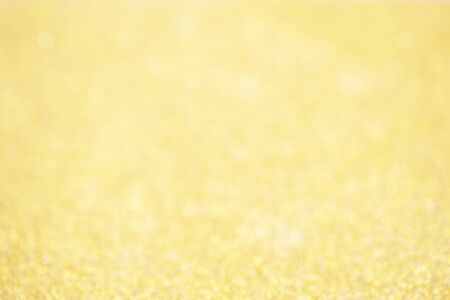 Gold sparkle glitter and copy space for Christmas background.の写真素材