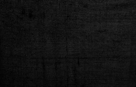 Black linen old fabric texture or background.の写真素材