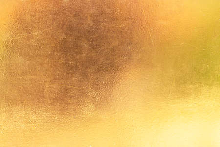 Gold abstract background or texture distress  scratch and gradients shadow.の写真素材