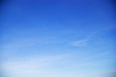 Blue sky background and white clouds soft focus, and copy space horizontal shape.の写真素材