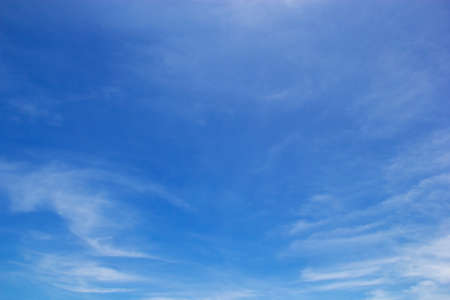 Blue sky background and white clouds soft focus, and copy space horizontal shape.の写真素材