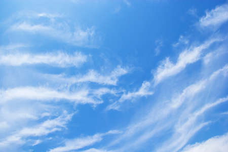 Blue sky background and white clouds soft focus, and copy space horizontal shapeの写真素材