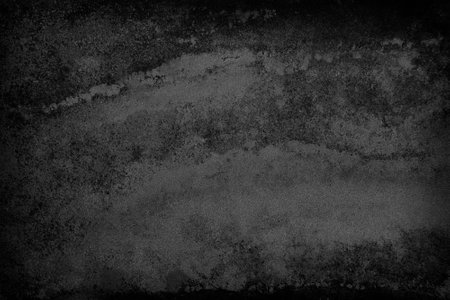 Dark grey black slate stone background or textureの写真素材
