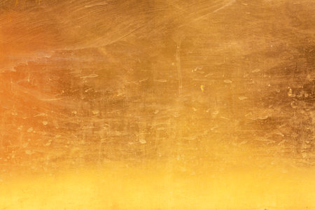 Gold background or texture dirty dry water stains abstract   distress  scratch and gradients shadow.の写真素材