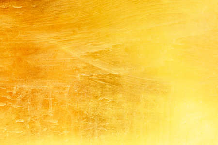 Gold background or texture dirty dry water stains abstract   distress  scratch and gradients shadow.の写真素材
