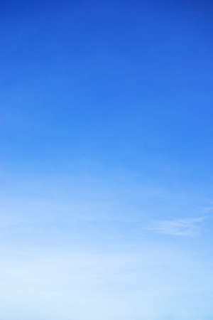 Clear blue sky background and empty space for your design, no cloud horizontal shape.の写真素材