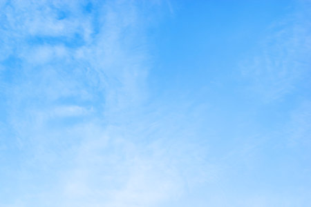Blue sky background and white clouds soft focus, and copy space horizontal shape.の写真素材