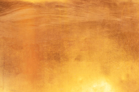 Gold background or texture dirty dry water stains abstract   distress  scratch and gradients shadow.の写真素材