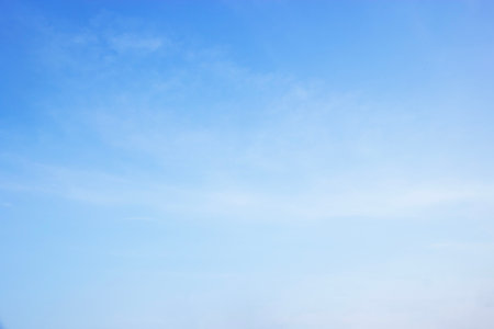 Fantastic soft white clouds against blue sky and copy space horizontal shapeの写真素材