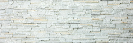 White brick wall as a background or texture, horizontal shape with space for design. Web banner. Wide. Panoramic. Website headerの写真素材