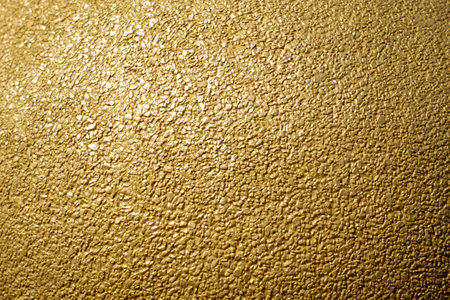 Gold concrete wall texture or background  and copy spaceの写真素材