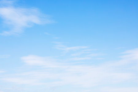 Fantastic soft white clouds against blue sky and copy space horizontal shapeの写真素材