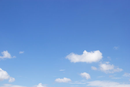 Blue sky background and white clouds soft focus, and copy space horizontal shape.の写真素材