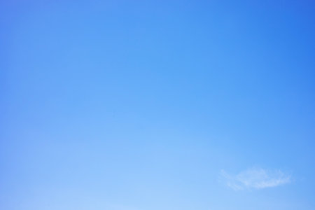 Fantastic soft white clouds against blue sky and copy space horizontal shapeの写真素材