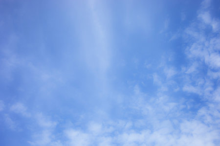 Blue sky background and white clouds soft focus, and copy space horizontal shape.の写真素材