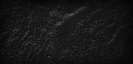 Dark gray black slate stone background or texture, horizontal shape with space for design. Web banner. Wide. Panoramic. Website headerの写真素材