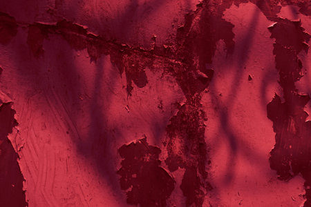 Black red rough surface. vintage grunge background texture for design. , Viva magenta color. Trend 2023. Close-up. backgroundの写真素材