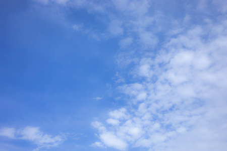 Blue sky background and white clouds soft focus, and copy space horizontal shape.の写真素材
