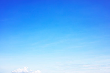 Blue sky background and white clouds soft focus, and copy space horizontal shape.の写真素材