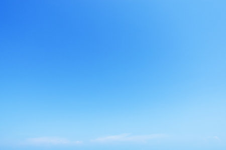 Clear blue sky background and empty space for your design.の写真素材