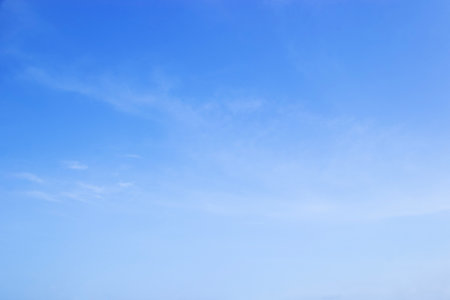 Fantastic soft white clouds against blue sky and copy space horizontal shapeの写真素材
