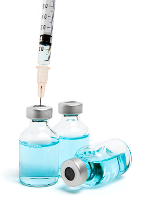 Drug injection with hypodermic syringeの写真素材