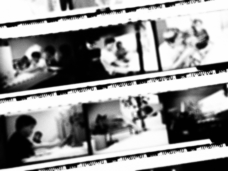 Blurred of 35mm film contact print with film grain on black and whiteの写真素材