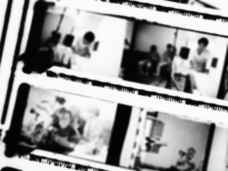 Blurred of 35mm film contact print with film grain on black and whiteの写真素材