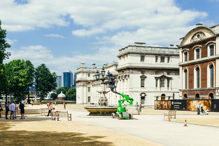 London, UK - July 23, 2018: worker maintenance the street light near the Royal Naval College, Greenwich, Londonのeditorial素材