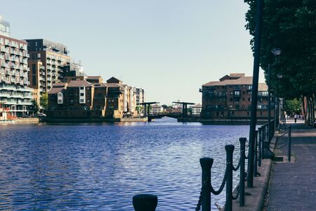 London, UK - July 23, 2018: Glengall Bridge is a bridge in the Milwall Inner Dock, Isle of Dogs. The...