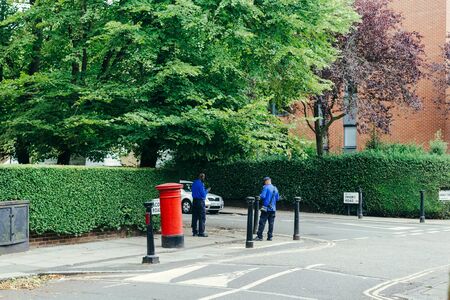 London, UK - July 30, 2018: Parking enforcement officers working on the Acol Road in West Hampstead,  London Borough of Camden, UKのeditorial素材