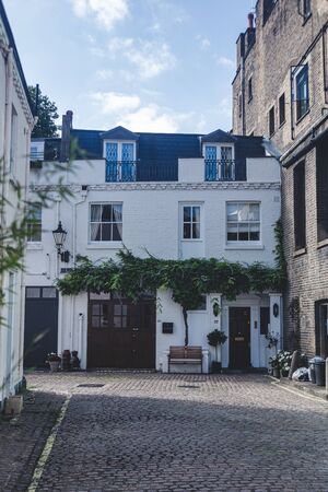 London/UK - 22/07/19: facade of a house in Lancaster Mews in Bayswater, an affluent area within the City of Westminster. It is also one of London's most cosmopolitan areasのeditorial素材